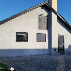 Vandskuring af hus i Spøttrup med færdig facade